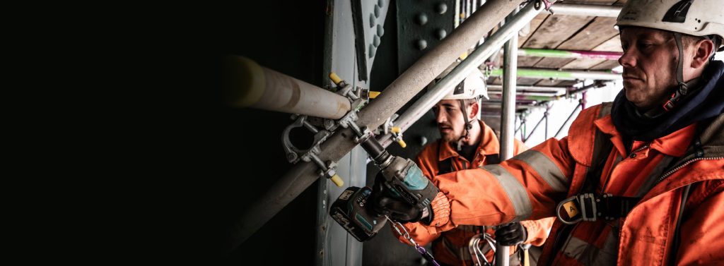 Two ISS Scaffolding employees working on the Tyne Bridge